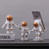 Support de téléphone astronaute, figurine de bureau créative, support multifonctionnel, gadget indispensable pour les fans de science-fiction