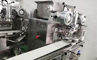 Machine chinoise Xiaolongbao Ligne de production de petits pains cuits à la vapeur en Chine avec machine à mettre du papier