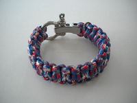 Bracelet durable, équipé d'un fermoir à pression, d'un design rotatif et d'une boucle en acier inoxydable, adapté aux activités de plein air.