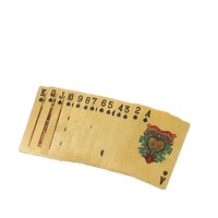 Cartes de poker en plastique PET noir et or, gamme complète en gros ; Cartes à thème dollar à carreaux noirs avec dorure à chaud, emballage en boîte couleur