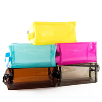 Pochette de voyage transparente en PVC imperméable personnalisée pour cosmétiques et maquillage avec fermeture éclair et poignée