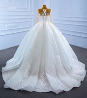 Robe de mariée de luxe Feishiluo à col rond, style moderne, coupe princesse, manches longues, ornée de perles, de paillettes et d'appliques brodées en dentelle