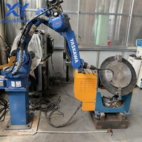 Robot de soudage YASKAWA à 6 axes, moteur PLC, bras robotique CNC, poste de travail collaboratif automatique avec table, charge utile de 12 kg, haute efficacité, Chine