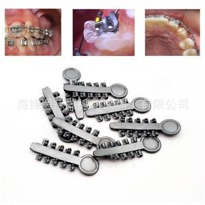 Bobinas de ligadura rotatorias Hf Dental, almohadillas de ortodoncia transparentes grises, paquete de 10 piezas para alineación dental en adultos - Product Image 1