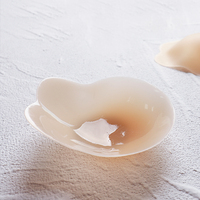 Couvre-mamelon de levage en forme de fleur d'oreille de lapin à double poussée mate en silicone solide avec emballage blister