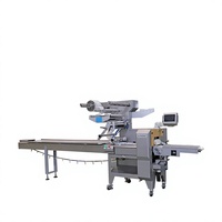 Machine d'emballage de type oreiller pour la production de biscuits, pains, gâteaux, nouilles instantanées et autres snacks en ligne de production