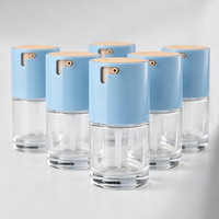 Flacon vide rond en verre transparent coloré de haute qualité de 30 ml pour cosmétiques, lotions, huiles, liquides, fond de teint, avec pompe doseuse