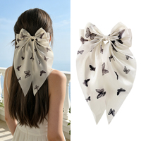 Vente en gros de pinces à cheveux élégantes en tissu fait main avec grand nœud en ruban imprimé papillon noir, accessoires capillaires mignons pour fêtes