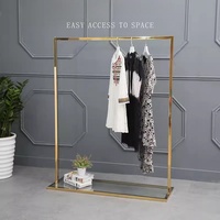 Porte-vêtements sur roulettes en acier inoxydable haut de gamme, moderne et élégant, avec taille personnalisable et montage facile pour les magasins de vêtements