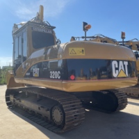 Chargeuse industrielle robuste et durable Cat 320C pour les opérations de chargement et de transport à grande échelle dans les chantiers commerciaux et les carrières