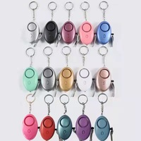 Porte-clés pompon en Silicone PU, alarme, auto-défense, avec pompon, vente en gros