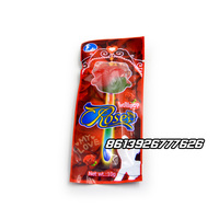 Sucette de bonbons halal en forme de rose rouge fluorescente