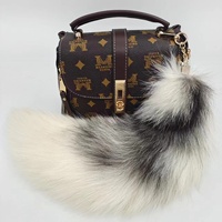 Porte-clés de luxe en véritable fourrure de renard, queue moelleuse en peluche, accessoire de décoration pour sac à main, idéal pour les fêtes cosplay