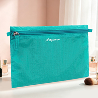 Sac de toilette léger en nylon Ripstop à marque privée, logo personnalisé, vente en gros OEM, cadeau promotionnel, rangement de voyage unisexe