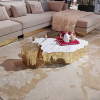 Table basse en marbre irrégulier haut de gamme sur mesure, table en métal inoxydable faite à la main pour les projets de meubles d'hôtels et de villas de luxe