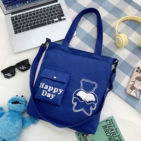Nouveau design en gros grands sacs à bandoulière shopping livre d'étudiant sac d'école fille ange ours sac à dos toile sac fourre-tout