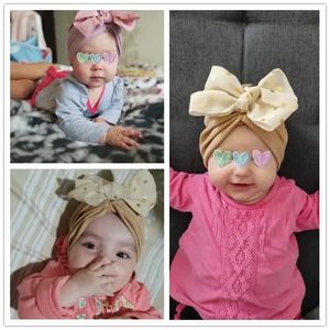 หมวกบีนนี่ผ้าโพกหัวผูกโบว์น่ารักสำหรับเด็กวัยหัดเดินผ้าคอตตอนนุ่ม - Product Image 6