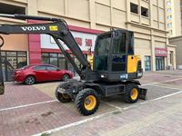 Excavatrice sur pneus d'occasion Volvo EW60 6 tonnes, d'origine Corée, avec ripper, machine de terrassement agricole, pelle hydraulique