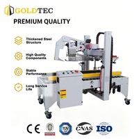 Machine de scellage automatique Goldtec pour cartons de tailles variées avec pliage du couvercle supérieur pour la logistique