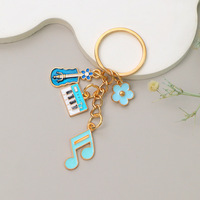 Doux Piano Guitare Violon Porte-clés Creative Alliage Éléments Musicaux Porte-clés Sac À Dos Clé Pendentif Accessoires Musican Recueillir Cadeau