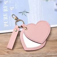 Porte-clés de voiture en cuir PU en forme de cœur, mignon, avec miroir, créatif, de luxe, mini, personnalisable avec logos, pour maquillage, vente en gros