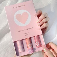 Emballage cosmétique de luxe personnalisé Boîtes en papier mat laminé rouge à lèvres baume à lèvres brillant à lèvres avec logo exclusif et doublure éponge