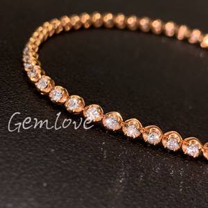 Elegant ladies' diamond bracelet crafted from 18K gold and set with <b>lab</b> grown round diamonds certified by <b>the</b> IGI laboratory - Product Image 2