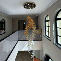 Lustre en verre et pierre irrégulière de style art moderne, suspension longue en spirale pour la décoration des escaliers de villa et des plafonds hauts
