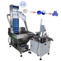 Machine automatique d'insertion de joints de bouchons de bouteilles Machine d'insertion de couvercles en plastique de revêtements de bouchons de bouteilles Machines d'insertion de presse en mousse