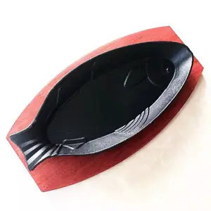 Hot sale Pre-seasoned Kitchenware Cast iron frying fish pan skillet sizzling plate fish shaped plates with wooden base