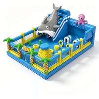 Château gonflable commercial extérieur personnalisé en forme de requin de 12*9m (108 m²) avec toboggan pour enfants
