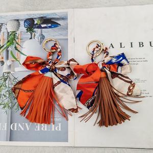 Porte-clés de sac à main pour femmes, tendance, en métal tissé à la main, écologique, durable, avec pendentif en forme de pompon, style coréen, vente chaude - Product Image 2