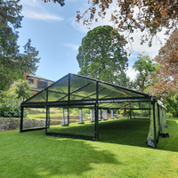 Tente de luxe noire avec parois latérales transparentes en PVC pour événements et banquets
