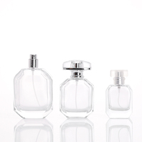 Bouteille de parfum en verre vide à couvercle transparent de luxe de haute qualité de 30ml/50ml avec sérigraphie et pulvérisateur à pompe
