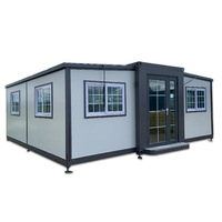 Casa Contenedor Prefabricada Expandible de Doble Ala con Estructura de Acero Oscuro, Casa Modular Móvil con Baño Preinstalado para Villa Vacacional