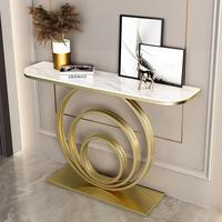 Console de luxe moderne pour entrée et salon avec plateau en dalle de roche et structure métallique durable pour usage hôtelier