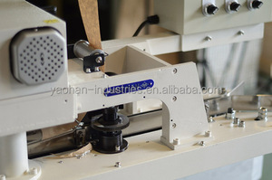 เครื่องเย็บกระสอบอุตสาหกรรมแบบเข็มเดี่ยวเย็บโซ่ ยี่ห้อ YAOHAN รุ่น New Core Motor Mechanical Automatic พร้อมสายพานลำเลียง - Product Image 3