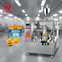 Machine de remplissage et d'emballage de sachets préformés Doypack pour liquides, sauces, jus de fruits, ketchup, huile de palme, gelée, soupes, lait, détergents