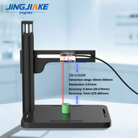 Machine de marquage laser à axe Z avec système de contrôle automatique de la hauteur et capteur de mesure de distance pour un ajustement précis de la mise au point