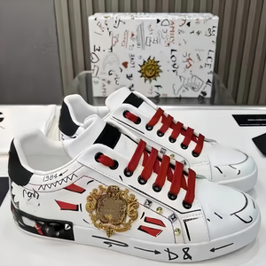 Chaussures décontractées pour hommes et femmes, tendance graffiti, logo de créateur de luxe, haute qualité, semelle en TPU, cuir véritable - Product Image 1