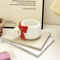Mug à café, thé, lait ou eau en céramique mignon de style INS avec un nœud 3D sur la poignée en forme de perle