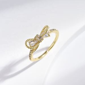 แหวนเงินแท้ 925 ชุบทอง 14k ประดับเพชรซิคอน รูปโบว์ ดีไซน์เรียบหรู สวยงาม แหวนเคลือบสี สำหรับสาวๆ ราคาโรงงาน ขายส่ง - Product Image 3