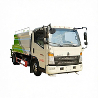 Camion arroseur Sinotruk Howo 7CBM avec canon à eau, moteur Weichai 140HP, fonction d'auto-amorçage, pour le lavage et l'irrigation des routes