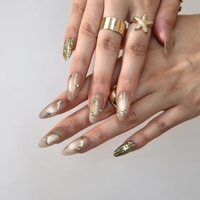 Ongles en acrylique de luxe à presser, base nude-rose champagne, étoiles dorées peintes à la main, lune dorée 3D en relief, décorations en strass