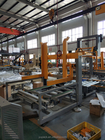 Machine de superposition et de désuperposition de palettes entièrement automatique. Manutention facile des palettes vides pour économiser du travail et optimiser l'entrepôt