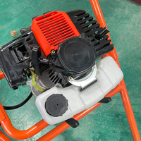 Vente en gros, 52cc, tarière manuelle à poussée manuelle à gaz, tarière de terre à essence avec roue unique