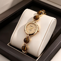 Montre pour femmes élégante et luxueuse avec pierres précieuses, style vintage avec cadran en perles PRO19
