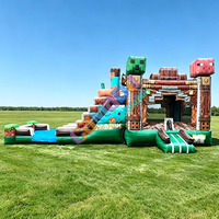 Château gonflable avec toboggan et piscine pour enfants et adultes, idéal pour les fêtes