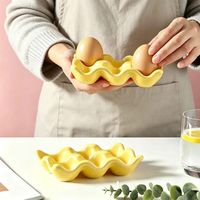 Plateau à œufs en céramique en gros, style nordique, en porcelaine créative, 6 compartiments, personnalisable OEM ODM, support à œufs de cuisine