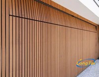 Puerta de garaje corrediza de aleación de aluminio con control remoto seccional moderno LONG TAI con rejilla en fábrica de China